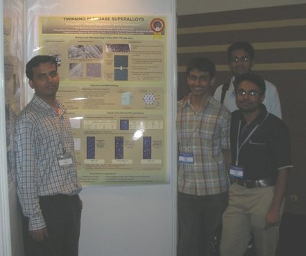 karthik2.JPG - Vinay's poster at the NMD-ATM meeting 2007. Vinay's poster on  MD simulations of twinning in superalloys was adjudged 2nd in the Metal Sciences category. The others are me, Rohan and Badri